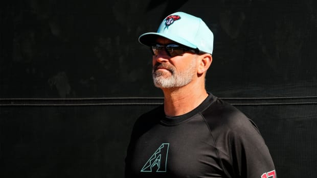 Arizona Diamondbacks manager Torey Lovullo (17) watches his team work out at Salt River Fields.